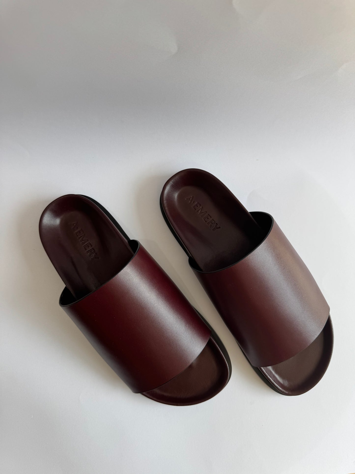 A. Emery Burgundy Slides