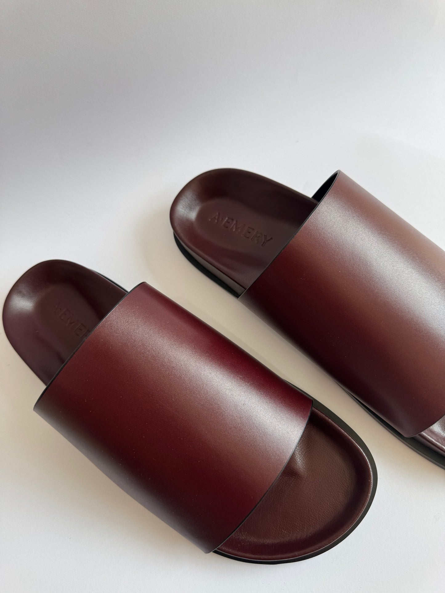 A. Emery Burgundy Slides