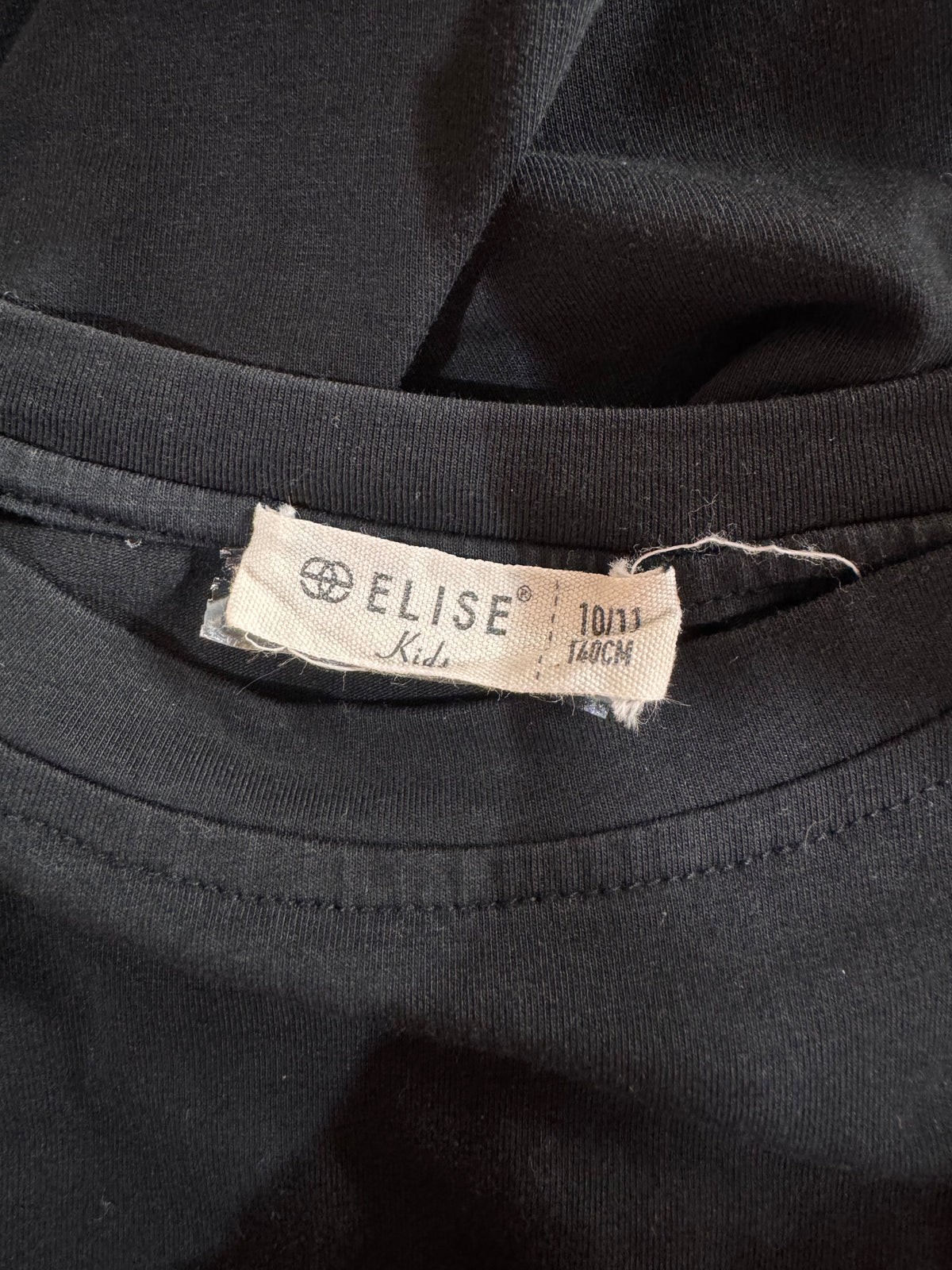 Elise Kids Black Asymmetrical Top- size XS